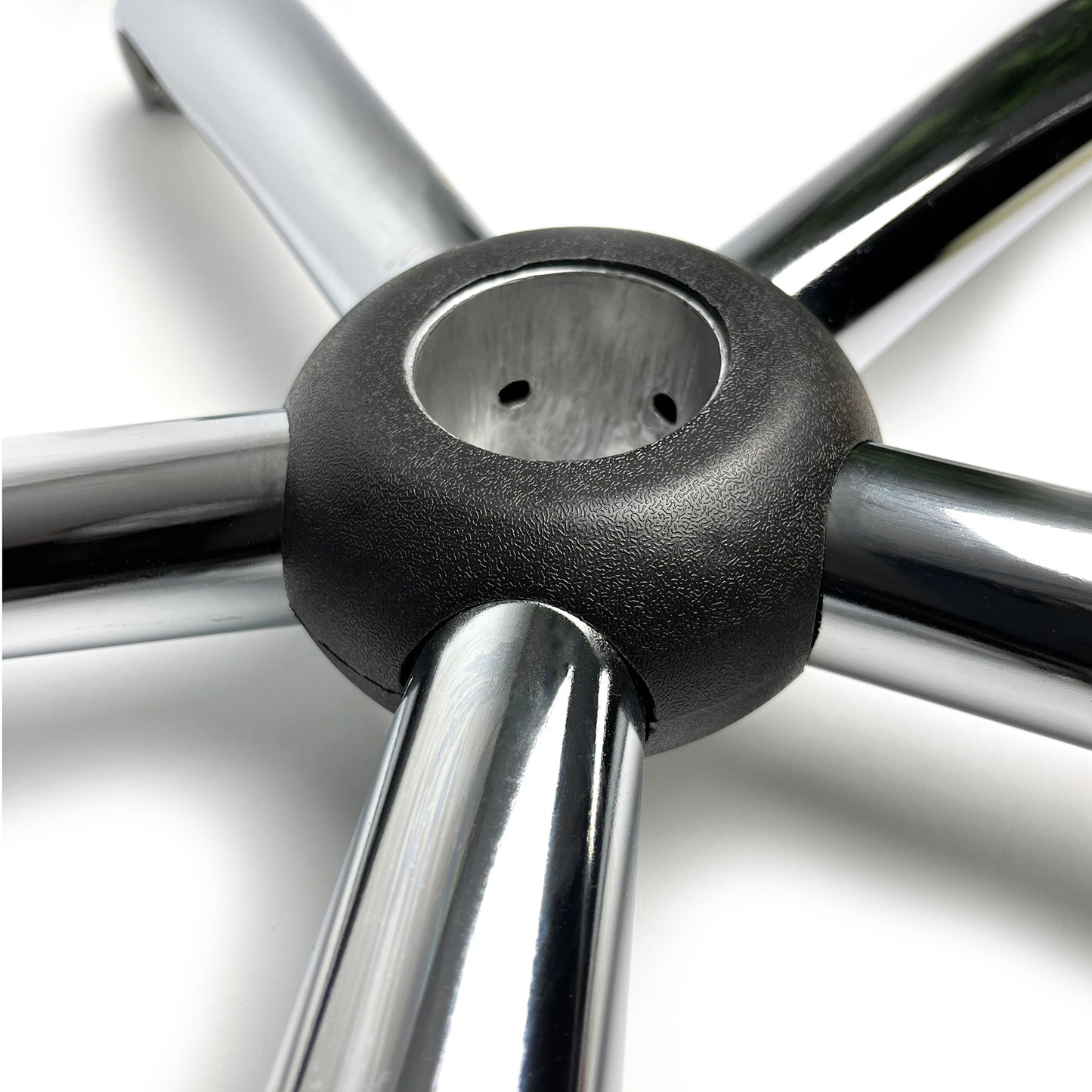 Close-up of the central part of a chrome office chair base, showing mounting details and glossy metal finish in a five-arm design.